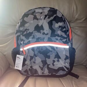 Camouflage Backpack with Orange Accents Reflective Laptop Up to 15” 25 Lbs NWT